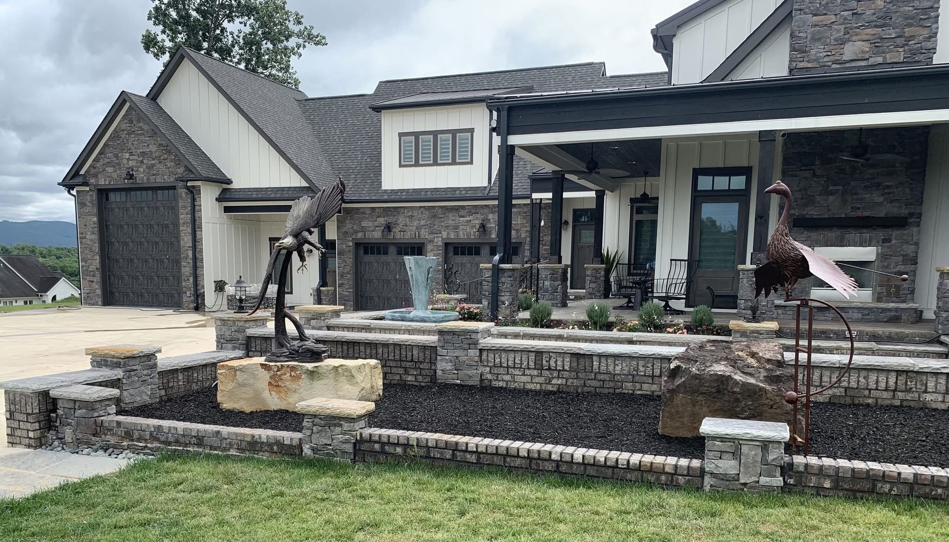 A large house with a large lawn in front of it.