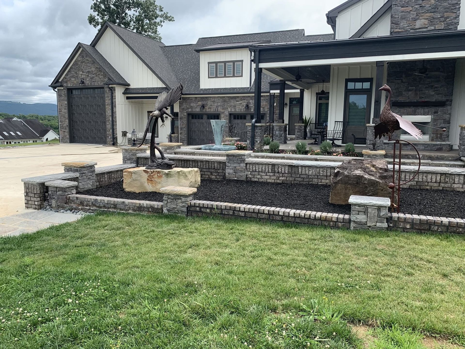 A large house with a large lawn.