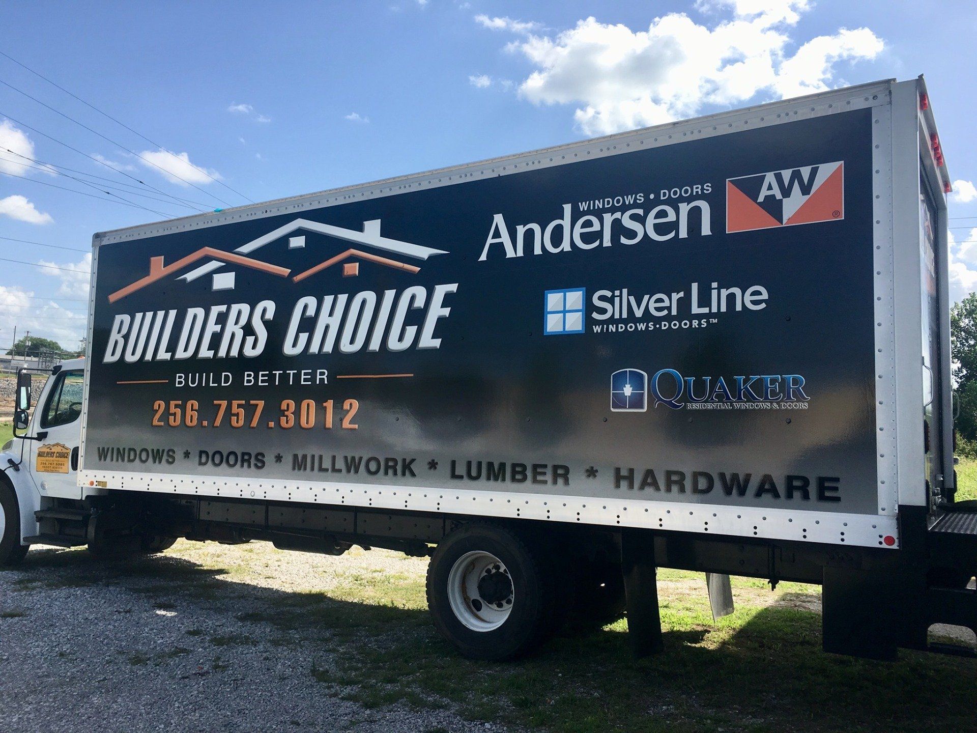 A builders choice truck is parked on the side of the road