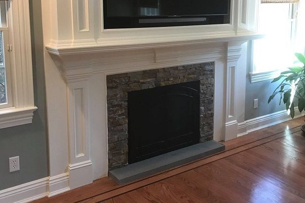 fireplace with stone surround