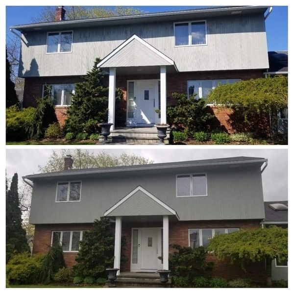 Before and after photos of a two-story house with brick and gray siding. The house has a new siding color.