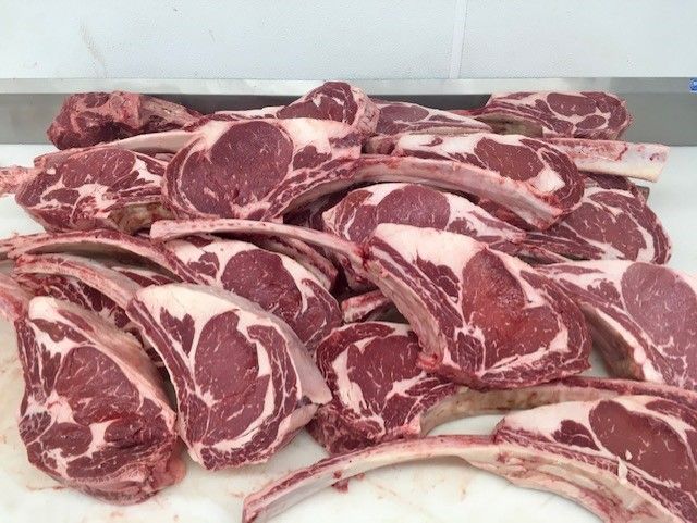 a pile of raw chops on a cutting board