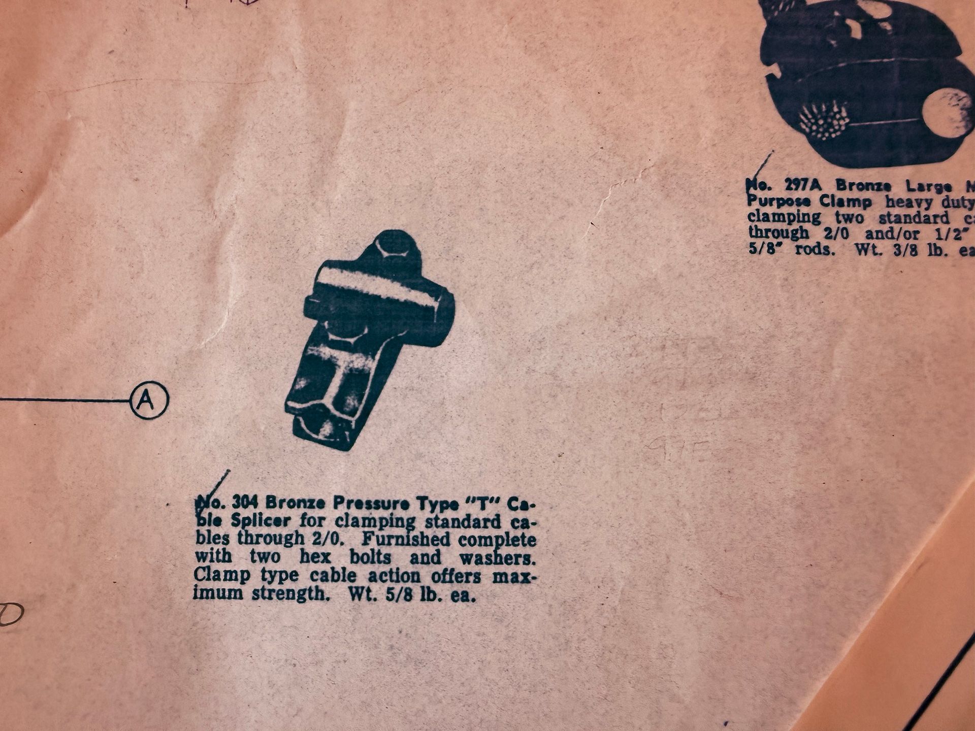 A vintage technical drawing showing a bronze T-connector cable clamp with descriptive text for industrial hardware.