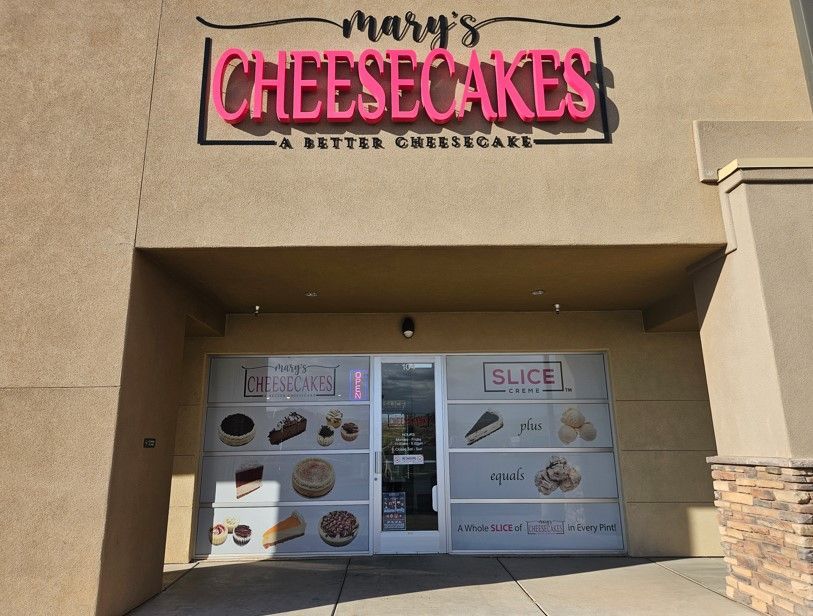 A sign for Mary's cheesecakes and a better cheesecake