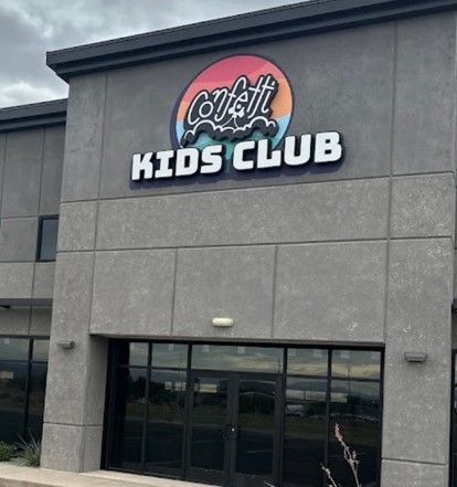 A building with a sign that says kids club
