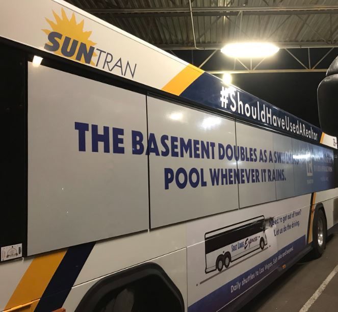 a suntran bus says the basement doubles as a pool whenever it rains