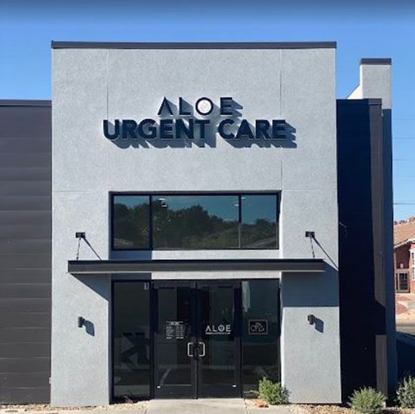 The front of a building that says aloe urgent care.