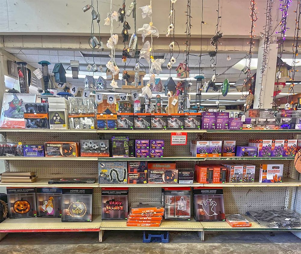 A store shelf filled with lots of halloween decorations