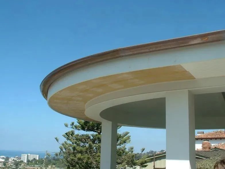 The roof of a building with a view of the ocean