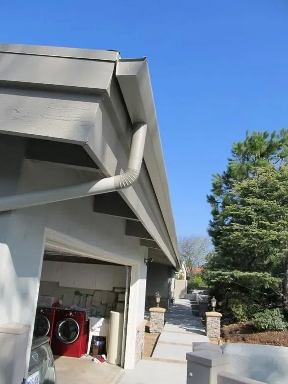 A house with a washer and dryer in the garage