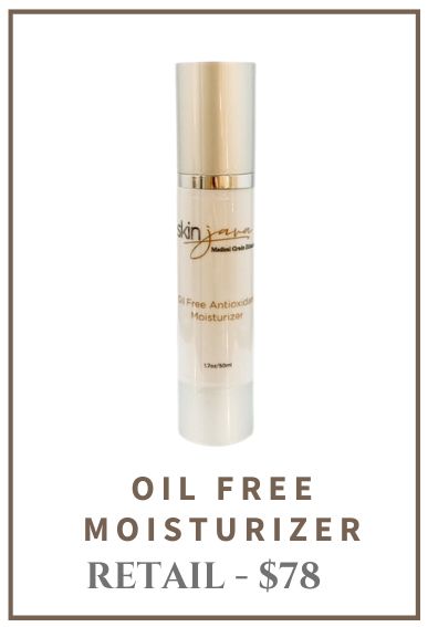 Oil-free moisturizer bottle, gold and white, product label, $78 retail price.