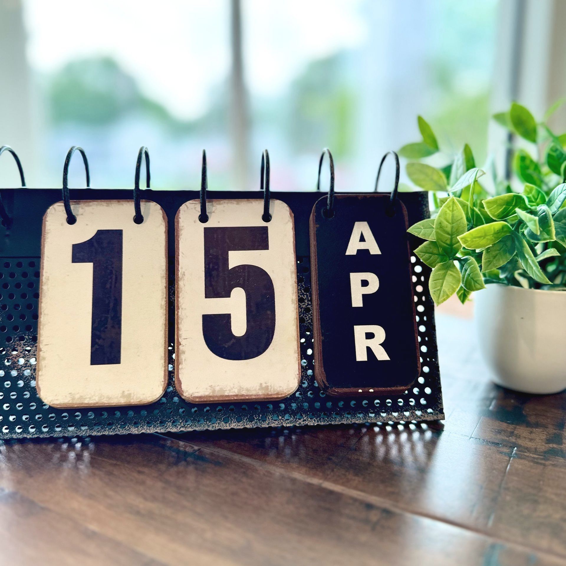 A calendar with the date of april 15 on it