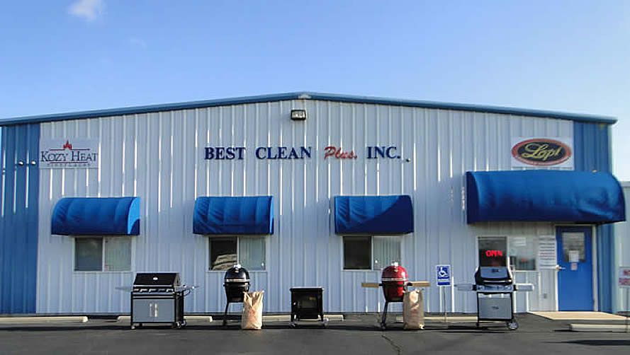 Exterior of Best Clean Inc. building with blue accents, awnings, and grills for sale.