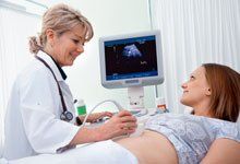 performing Sonograms to the patient
