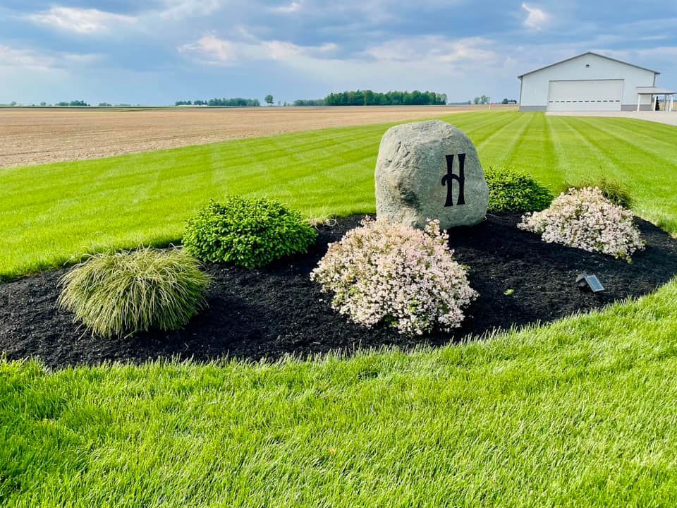 A rock with the letter 