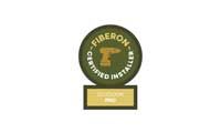 Fiberon Certified Installer badge, green and gold, round with text and a stylized 