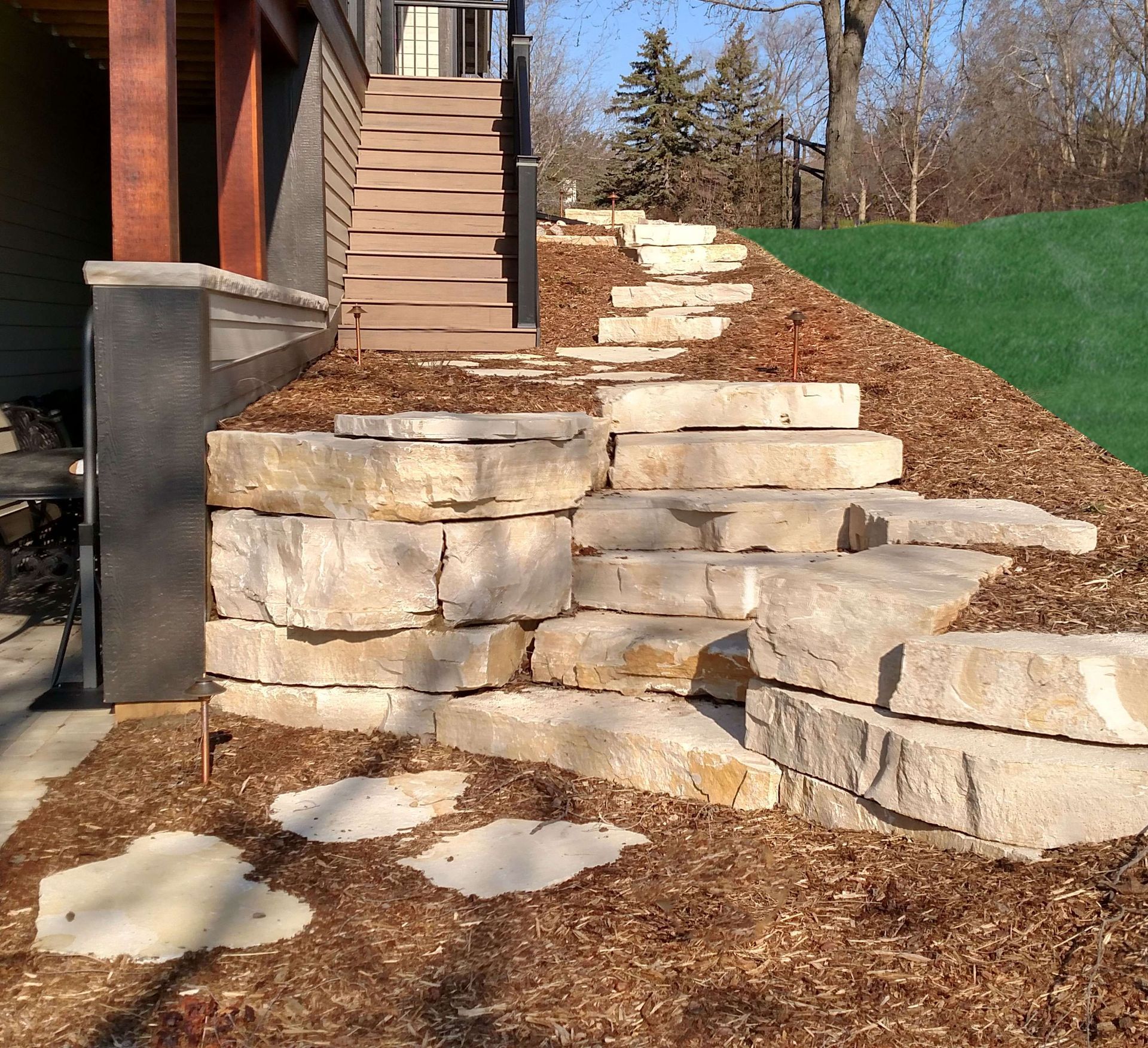 A set of stone steps leading up to a house