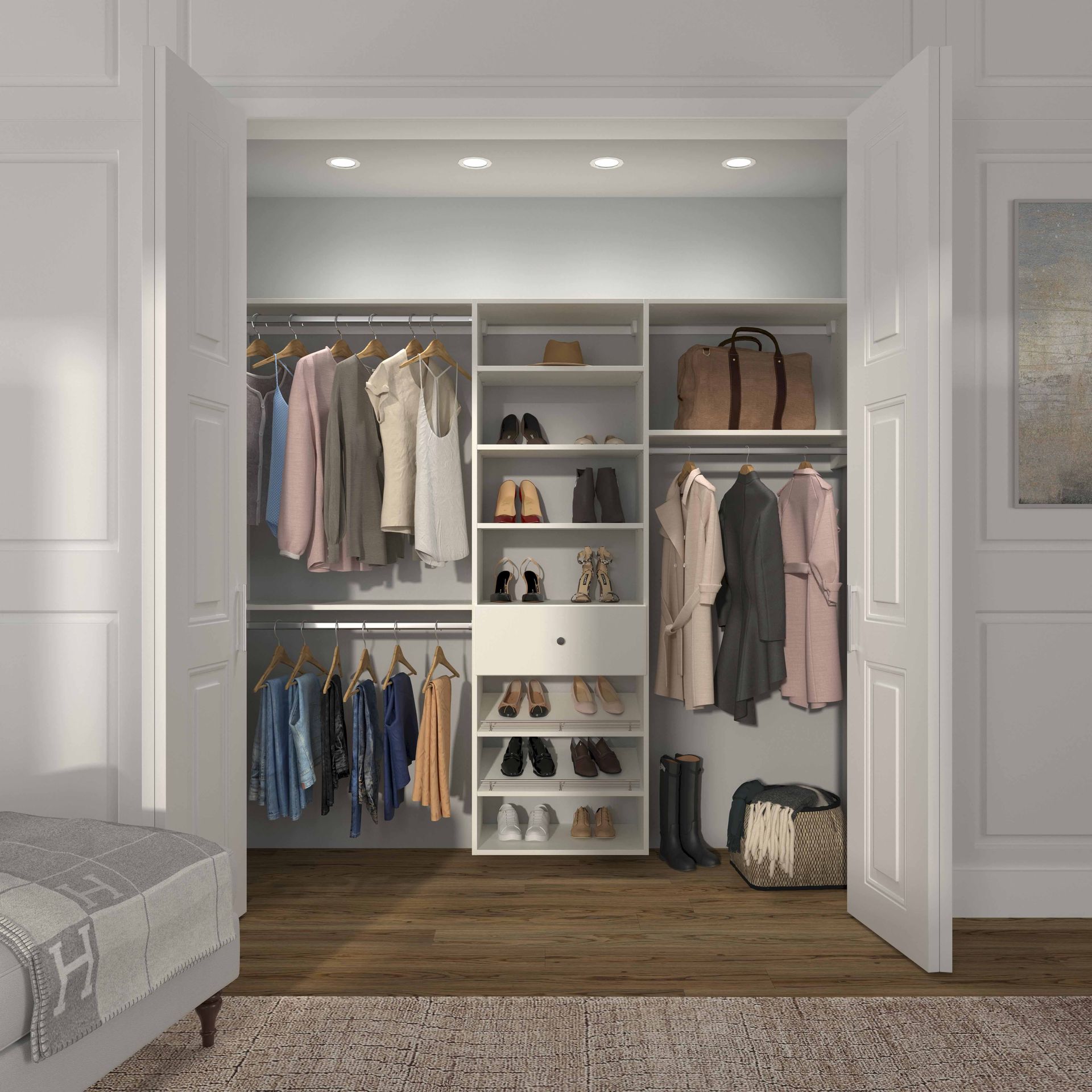 Walk-in closet with hanging clothes, shelves, shoes, handbags, and a wood floor