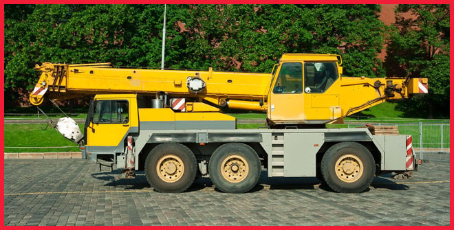 Yellow crane truck