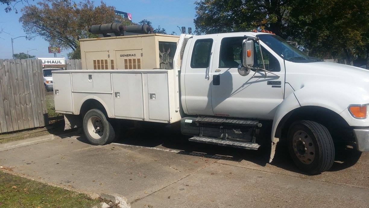 Service truck carrying generator