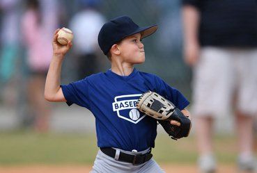 Child playing baseball