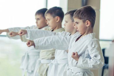 Children studying martial arts