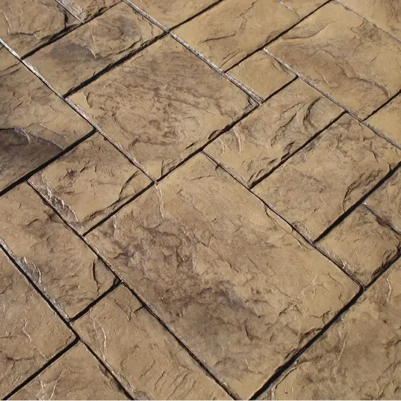 A close up of a brick floor with a diagonal pattern