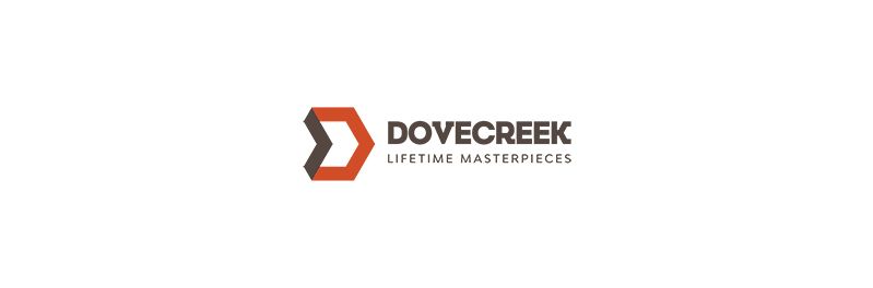 Logo of Dovecreek with a geometric arrow design in brown and red, and the words "LIFETIME MASTERPIECES".