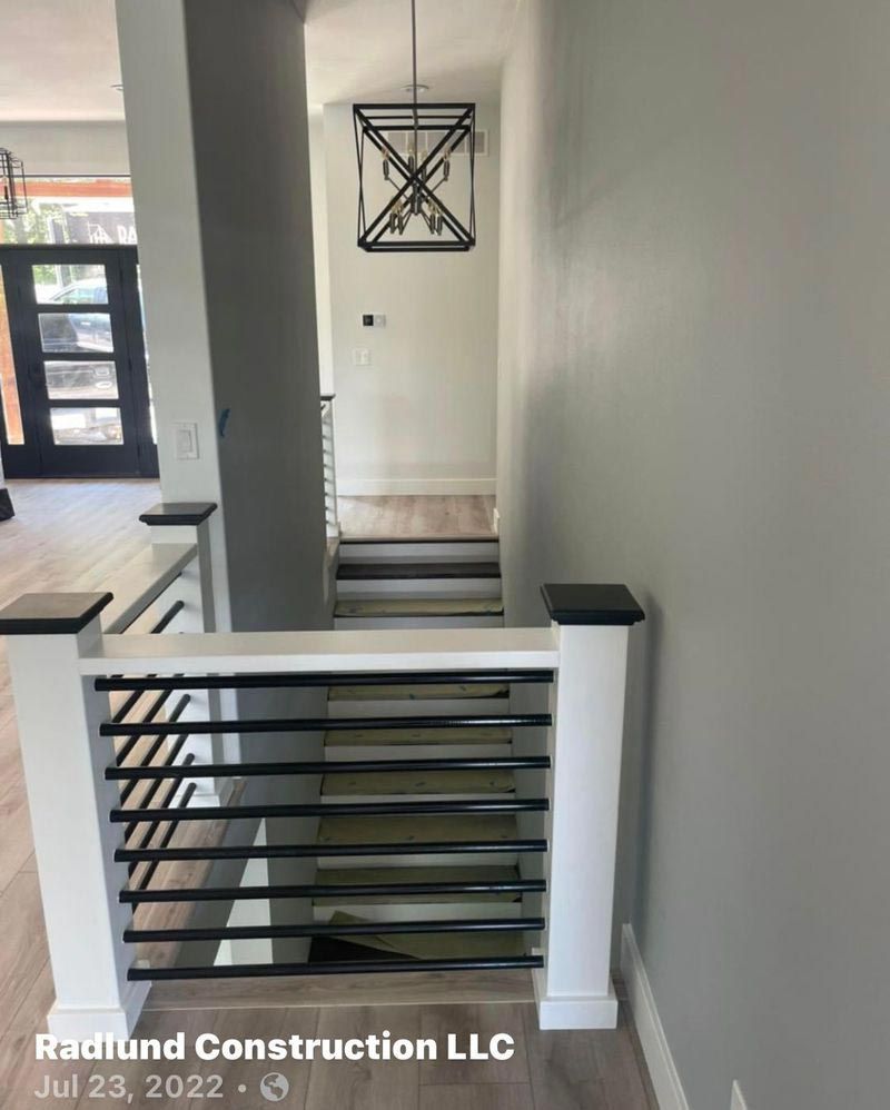 A picture of a staircase taken by radlund construction llc