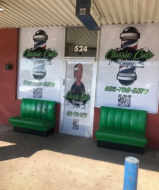 Classic Cuts storefront with green benches and a glass door marked 524.