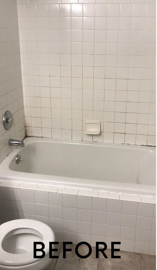 A before picture of a bathroom with a bathtub and toilet.