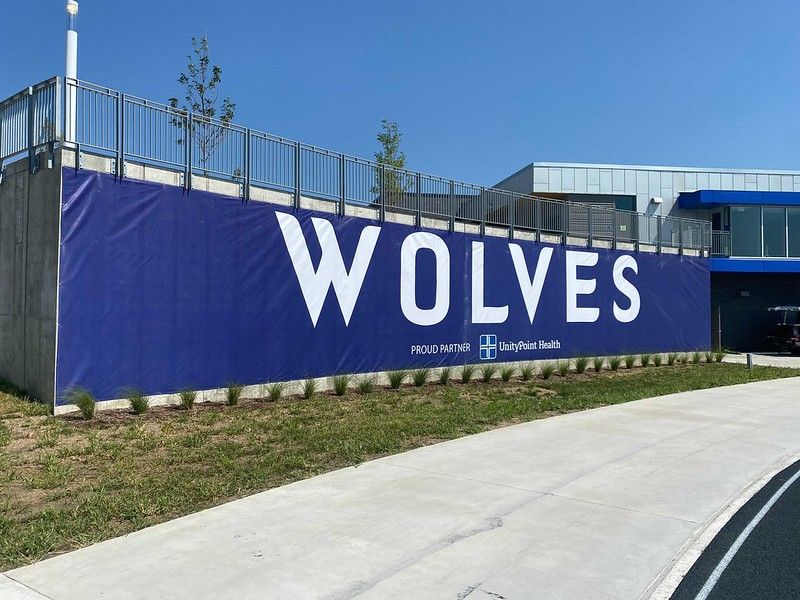 A blue wall displaying the word 