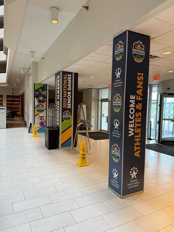 Two pillars in a bright lobby display 