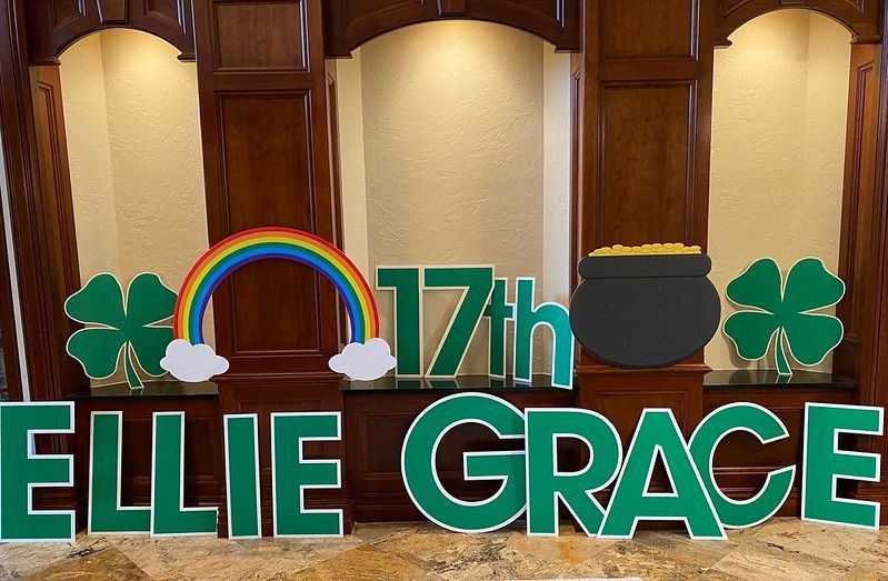 A St. Patrick's-themed yard sign display reading 