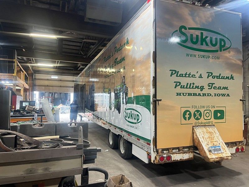 A Sukup semi-trailer parked inside a shop, featuring 
