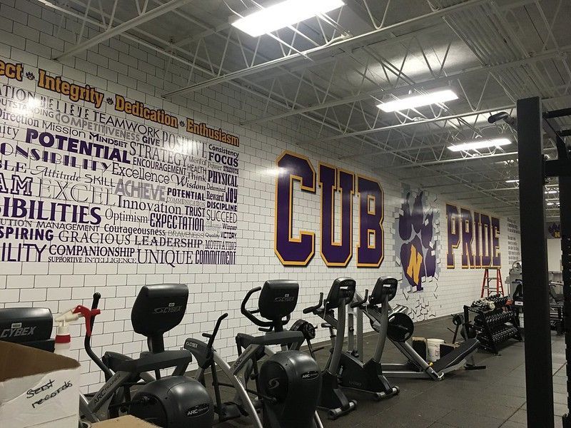 A fitness center wall with 