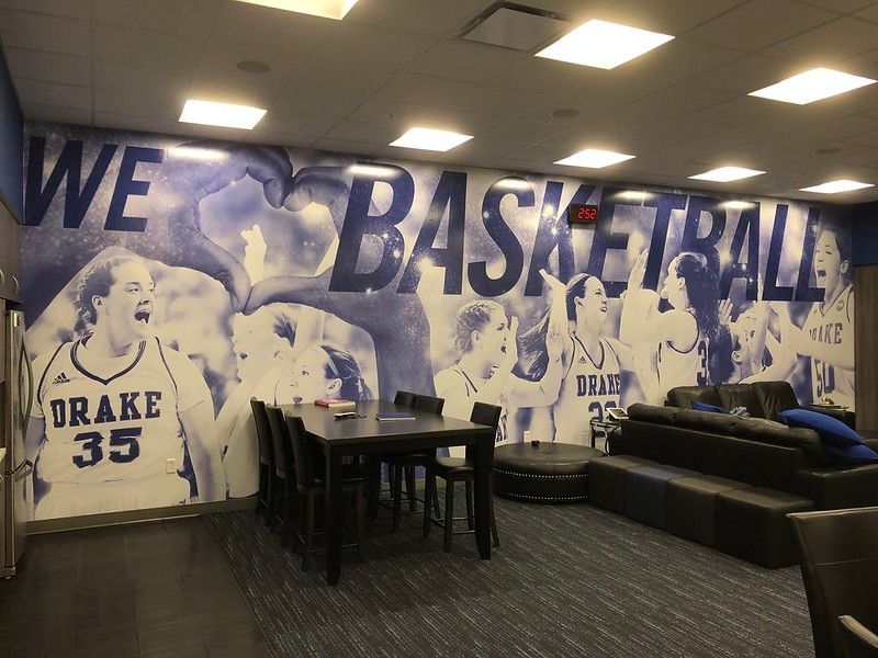 A mural in a lounge reads 