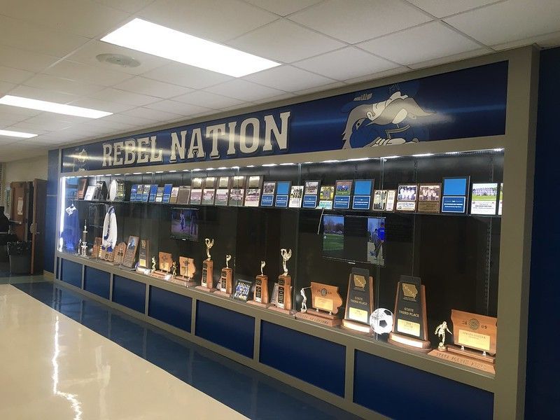 A hallway display case for 