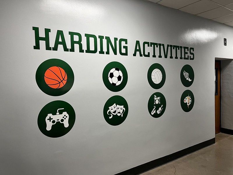 A school wall sign reading 