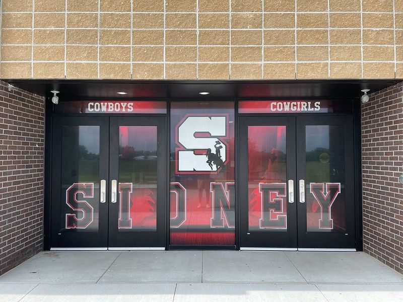 Entrance doors labeled 