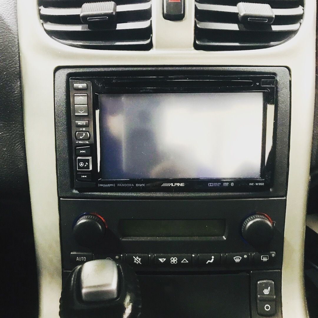 A car radio with a screen that says fare