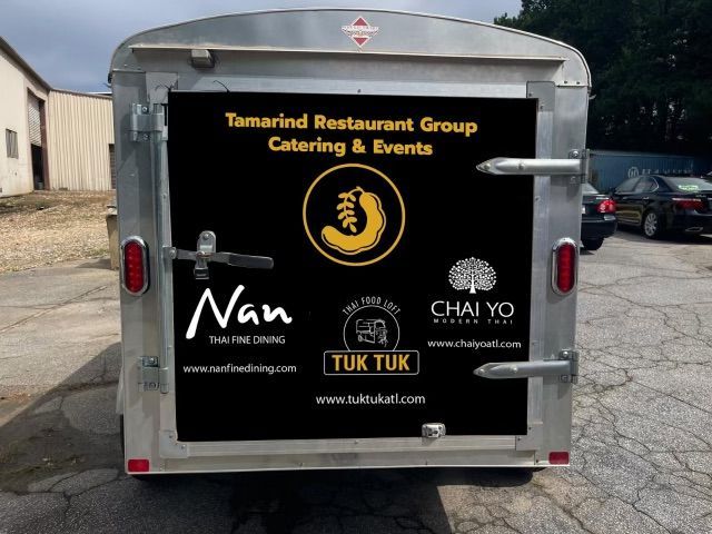 A trailer with a sticker that says tamarind restaurant group catering & events