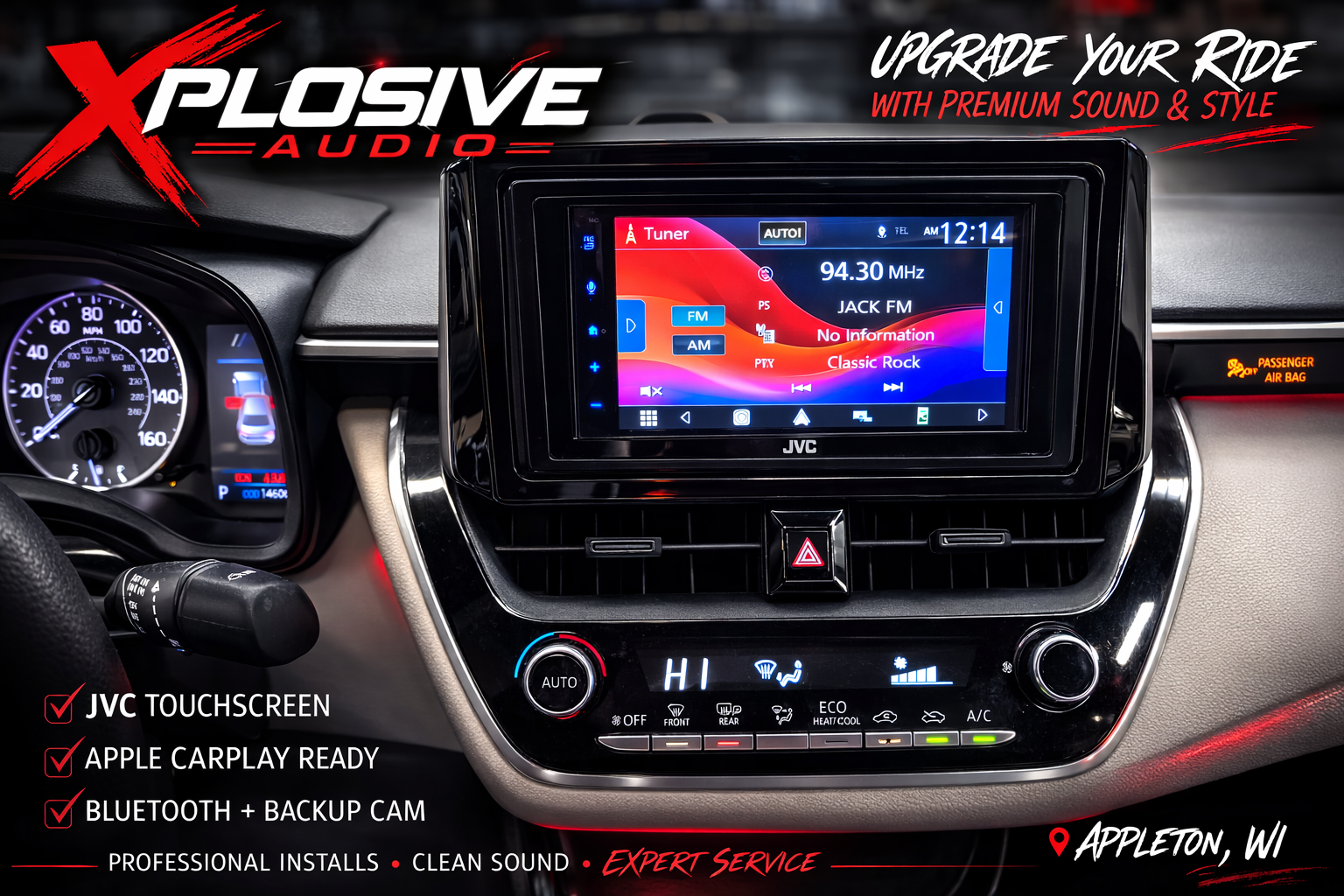 A JVC touchscreen head unit installed in a car dashboard, advertising Xplosive Audio services in Appleton, WI.