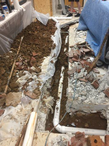 laying pipes on the ground