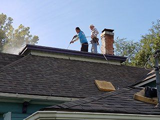 Roof contractors on roof