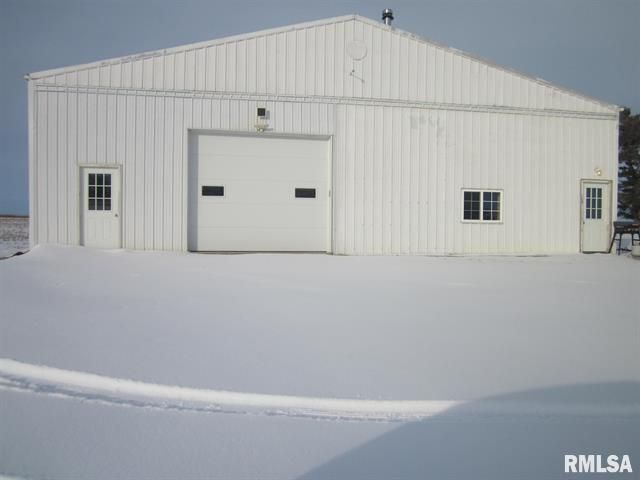 A large white building with a rmlsa logo on the side