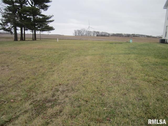 A large grassy field with rmlsa written on the bottom