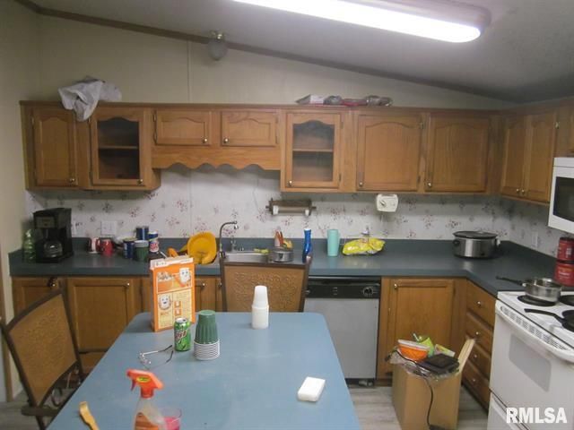 Kitchen with light-colored cabinets