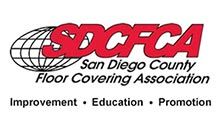Logo for San Diego County Floor Covering Association: red text, globe graphic, text 