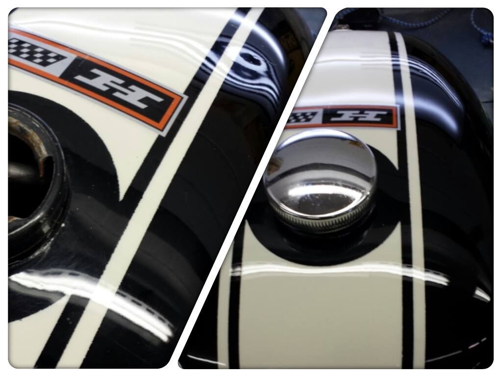 a black and white harley davidson motorcycle tank